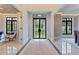 Bright foyer showcasing marble floors, decorative rug, and stunning windows providing ample natural light at 3968 Ashford Dunwoody, Brookhaven, GA 30319