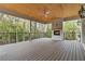 Spacious outdoor deck and wood-burning fireplace framed by sleek black railings at 3968 Ashford Dunwoody, Brookhaven, GA 30319