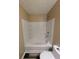 Bathroom features a combination tub and shower unit at 5104 Fairington Village Dr # 5104, Lithonia, GA 30038