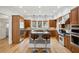 Spacious kitchen featuring a large island, stainless steel appliances, and custom cabinetry at 2039 Fisher Ne Trl, Atlanta, GA 30345