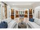 Open-concept living area with hardwood floors seamlessly connects to the kitchen at 2039 Fisher Ne Trl, Atlanta, GA 30345