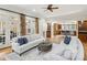 Inviting living room with fireplace, hardwood floors, and access to outdoor spaces at 2039 Fisher Ne Trl, Atlanta, GA 30345