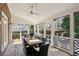 Charming screened porch with wood decking and ample seating, perfect for relaxation at 2039 Fisher Ne Trl, Atlanta, GA 30345