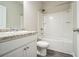 Bathroom features a white vanity with granite countertop and a shower-tub combination at 2534 Grayton Loop, Villa Rica, GA 30180