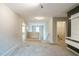 Open hallway with carpet flooring leading to a laundry area, offering convenience and seamless connectivity at 2534 Grayton Loop, Villa Rica, GA 30180