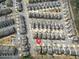 Wide aerial shot of the home within a community of similar houses and street grid at 4325 Bellview Ln, Duluth, GA 30097