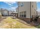 View of a backyard featuring a covered patio area and manicured lawn at 4325 Bellview Ln, Duluth, GA 30097