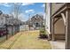 Fenced backyard with partial view of a covered patio at 4325 Bellview Ln, Duluth, GA 30097