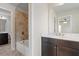 Bathroom with dark wood vanity, marble countertop, and tile flooring at 4325 Bellview Ln, Duluth, GA 30097