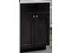 Dark-stained wood kitchen cabinet, perfect for storage at 4325 Bellview Ln, Duluth, GA 30097