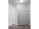 Spacious closet area with metal shelving and neutral walls at 4325 Bellview Ln, Duluth, GA 30097