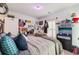 Cozy bedroom with comfortable bed, personal decorations, and ample natural light at 5225 Tye Trl, Fairburn, GA 30213