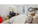Bright bedroom with a window, closet and lovely decor at 5225 Tye Trl, Fairburn, GA 30213