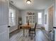 Bright dining room featuring lots of natural light and an antique china cabinet at 64 Roberson Ne Dr, Cartersville, GA 30121