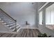 Foyer with a staircase and a large window at 64 Roberson Ne Dr, Cartersville, GA 30121