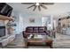 Inviting living room showcasing a stone fireplace, built-in shelves, and a comfortable seating area at 64 Roberson Ne Dr, Cartersville, GA 30121