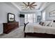 Elegant main bedroom with dresser, mirror, and cozy decor at 64 Roberson Ne Dr, Cartersville, GA 30121