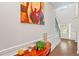 Elegant foyer featuring hardwood floors, console table, and stylish decor at 2167 Dodson Woods Dr, Fairburn, GA 30213