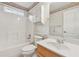 Full bathroom featuring a tub with shower, toilet, vanity with sink, and medicine cabinet at 219 Prominent Loop, Mcdonough, GA 30253
