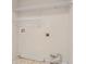 This laundry room has wire shelving and hookups for a washer and dryer at 219 Prominent Loop, Mcdonough, GA 30253