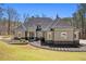 Stunning home featuring meticulous landscaping and charming architectural detail, perfect for elegant living at 3141 Buck Branch Sw Rd, Conyers, GA 30094