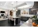 Open concept kitchen featuring a large island and stainless steel appliances, viewed from the living room at 3141 Buck Branch Sw Rd, Conyers, GA 30094
