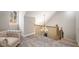 Upper level sitting area has natural light, chandelier and beautiful staircase at 3141 Buck Branch Sw Rd, Conyers, GA 30094