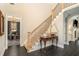 Bright staircase featuring elegant iron railings and a view into the nearby office at 3141 Buck Branch Sw Rd, Conyers, GA 30094
