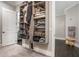 Spacious walk-in closet boasts custom shelving and ample storage space for organized living at 3141 Buck Branch Sw Rd, Conyers, GA 30094