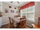 Charming dining area with a view of the front yard at 145 Alcovy Cir, Covington, GA 30014