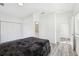 Cozy bedroom with a large bed, closet space, and access to an en-suite bathroom at 2000 Ocean Nw Dr, Atlanta, GA 30318
