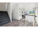 Bright entryway with stairs, stylish flooring, and a foosball table for added entertainment at 2000 Ocean Nw Dr, Atlanta, GA 30318