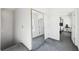 Bright hallway with a full length mirror and a view into a bedroom at 2000 Ocean Nw Dr, Atlanta, GA 30318