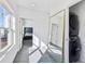 Hallway with a laundry closet, large mirror, and view into a bedroom at 2000 Ocean Nw Dr, Atlanta, GA 30318