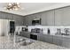 Modern kitchen featuring gray cabinetry, stainless steel appliances, and granite countertops at 2000 Ocean Nw Dr, Atlanta, GA 30318