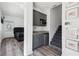 Cozy living space featuring a wet bar, a bedroom, and stairs leading to another level at 2000 Ocean Nw Dr, Atlanta, GA 30318