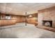 The partially finished basement has wood paneling and light carpet at 448 Buckingham Dr, Marietta, GA 30066
