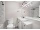 Updated bathroom featuring a marble-look shower, new vanity, modern fixtures, and contemporary lighting at 448 Buckingham Dr, Marietta, GA 30066