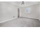 Bedroom with carpet, one window for natural light, closet doors and ceiling fan at 448 Buckingham Dr, Marietta, GA 30066