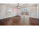 Spacious dining room boasts hardwood floors, neutral paint, and a sliding glass door leading to the deck at 448 Buckingham Dr, Marietta, GA 30066