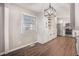 Modern eat-in kitchen with stainless steel appliances, white cabinets, and hardwood floors at 448 Buckingham Dr, Marietta, GA 30066