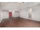 Open-concept living room with high ceilings, hardwood floors, and a staircase leading to upper level at 448 Buckingham Dr, Marietta, GA 30066