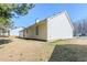 Spacious backyard with lush grass, offering privacy and room for outdoor activities at 835 Old Rocky Rd, Atlanta, GA 30349