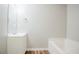 Well-lit bathroom with modern sink and tub at 835 Old Rocky Rd, Atlanta, GA 30349
