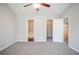 Neutral bedroom offers carpet floors and multiple closets at 835 Old Rocky Rd, Atlanta, GA 30349