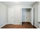 Laundry room featuring wood flooring, washer and dryer hook-ups at 835 Old Rocky Rd, Atlanta, GA 30349