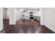 Open-concept living space features hardwood floors and seamless flow into the modern kitchen at 2506 Maple St, East Point, GA 30344