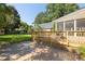 View of the stone patio and wood deck highlighting outdoor living spaces at 2533 Briers North Dr, Atlanta, GA 30360