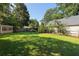 A large backyard featuring a storage shed and plenty of green space at 2533 Briers North Dr, Atlanta, GA 30360