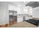 Contemporary kitchen with white cabinets, granite counters, and stainless steel refrigerator at 2533 Briers North Dr, Atlanta, GA 30360